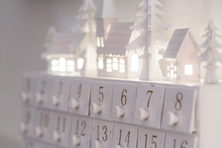 White Calendar on a white surface showing Don't Break The Streak [December]